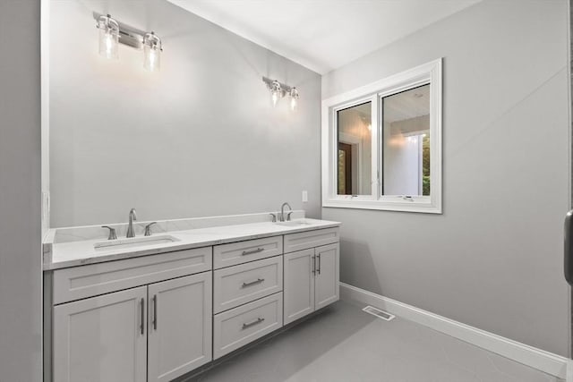 11 Olde Stable Ln, Easton, MA 02356 - full bath with tile patterned floors and double vanity
