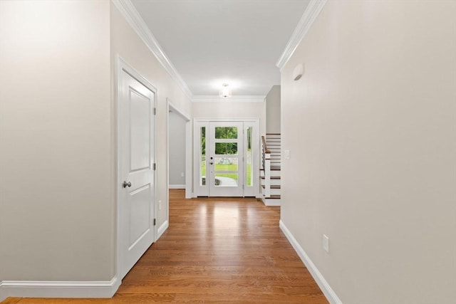 11 Olde Stable Ln, Easton, MA 02356 - hallway with light wood-style flooring and ornamental molding