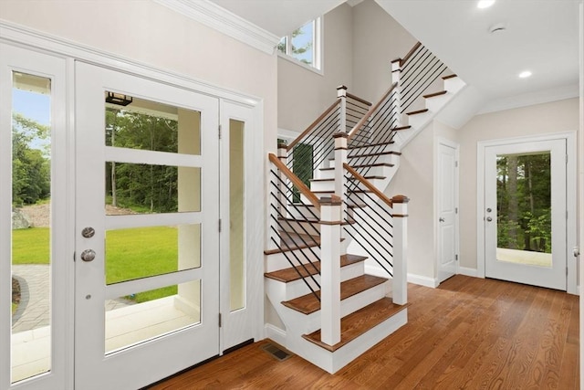 11 Olde Stable Ln, Easton, MA 02356 - foyer entrance featuring crown molding, stairway, wood finished floors, and recessed lighting