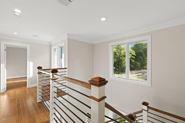 11 Olde Stable Ln, Easton, MA 02356 - hall with an upstairs landing, light wood finished floors, ornamental molding, and recessed lighting