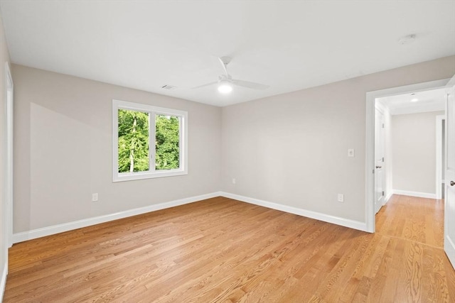 11 Olde Stable Ln, Easton, MA 02356 - spare room featuring light wood-style floors and ceiling fan