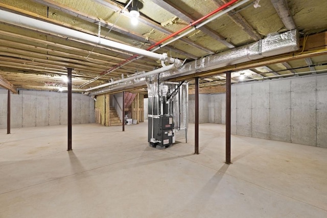 11 Olde Stable Ln, Easton, MA 02356 - unfinished below grade area with heating unit and stairway