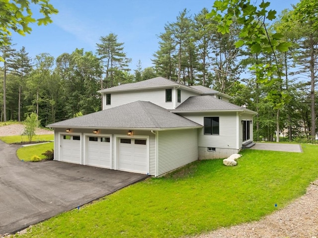 11 Olde Stable Ln, Easton, MA 02356 - view of side of home featuring a garage, a lawn, driveway, and roof with shingles