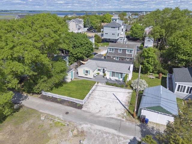 birds eye view of property with a residential view