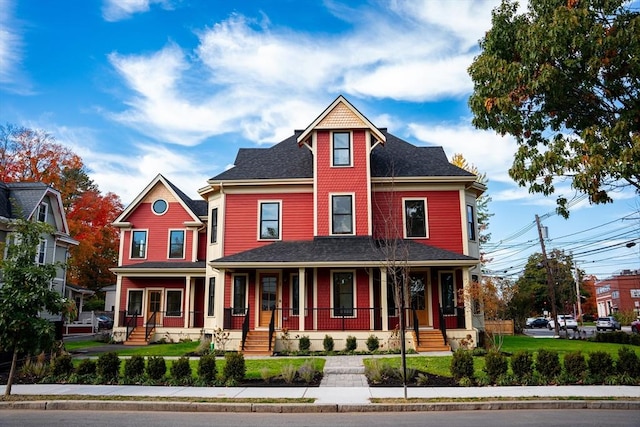 view of front of property featuring covered porch