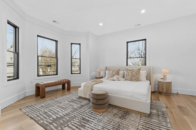 sitting room with light hardwood / wood-style flooring