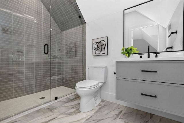 bathroom with toilet, vaulted ceiling, a shower with shower door, and vanity