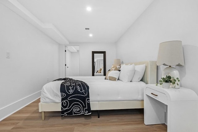 bedroom featuring hardwood / wood-style floors