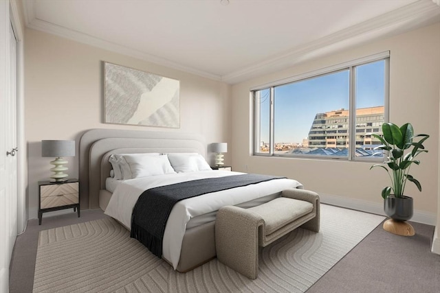 bedroom with ornamental molding and carpet