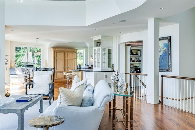 31 Moss Rd, Yarmouth, MA 02673 - living room featuring wood finished floors and recessed lighting