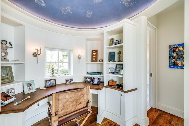 31 Moss Rd, Yarmouth, MA 02673 - home office with built in desk and dark wood-style floors