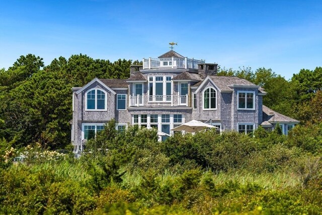 31 Moss Rd, Yarmouth, MA 02673 - back of house with a balcony
