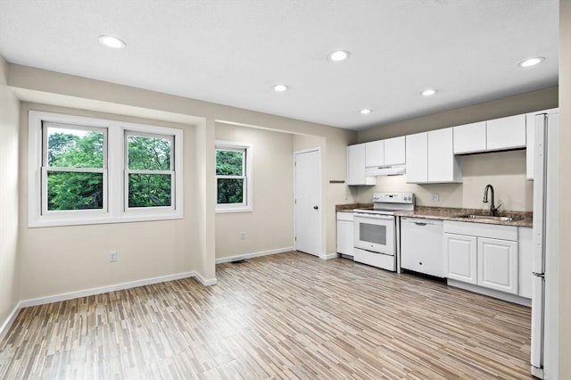 13 Fillmore Rd Unit 15Ab, Salem, MA 01970 - kitchen with white appliances, light wood-type flooring, white cabinetry, recessed lighting, and under cabinet range hood
