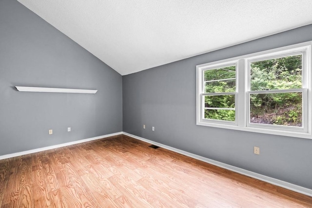 13 Fillmore Rd Unit 15Ab, Salem, MA 01970 - unfurnished room with lofted ceiling and wood finished floors
