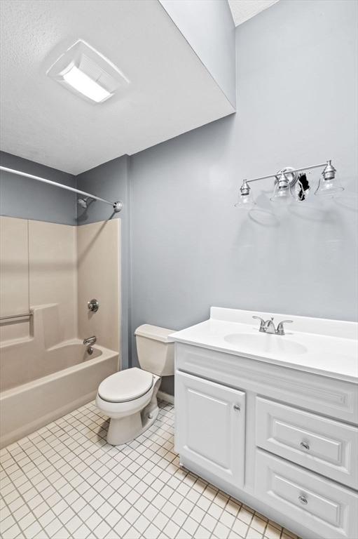 13 Fillmore Rd Unit 15Ab, Salem, MA 01970 - bathroom with vanity, shower / bathtub combination, and tile patterned flooring