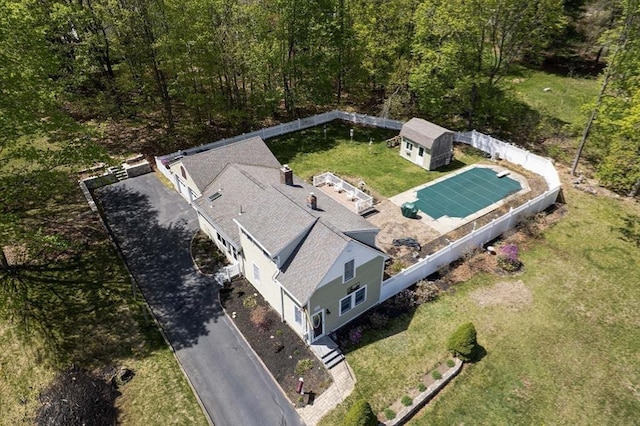 bird's eye view featuring a view of trees