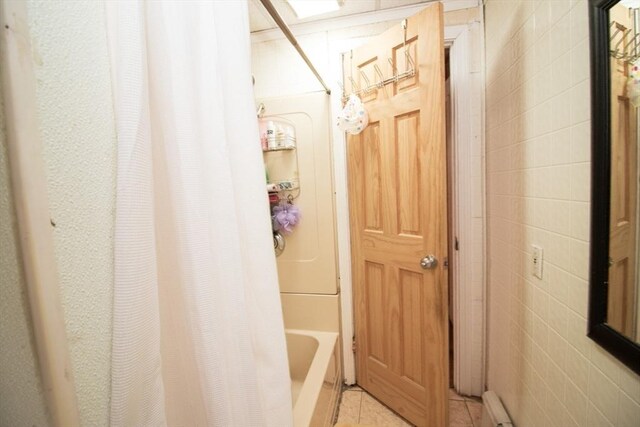 33 Cady St, Lowell, MA 01852 - hallway with light tile patterned flooring