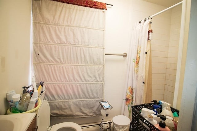 33 Cady St, Lowell, MA 01852 - bathroom with toilet, vanity, a baseboard heating unit, and a shower with shower curtain