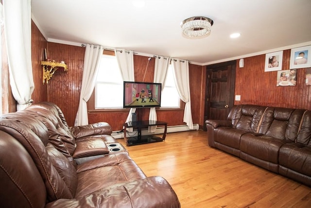 33 Cady St, Lowell, MA 01852 - living area featuring plenty of natural light, wood walls, wood finished floors, and crown molding