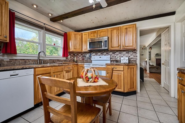 10 Phillips Dr, Colrain, MA 01340 - kitchen with white appliances, light tile patterned floors, a sink, backsplash, and wooden ceiling with exposed beams