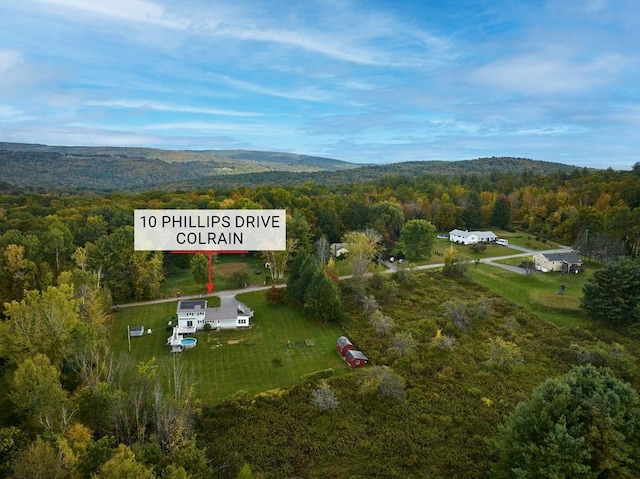 10 Phillips Dr, Colrain, MA 01340 - aerial view of property and surrounding area with a heavily wooded area