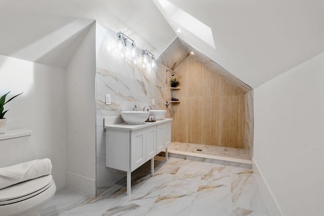 bathroom featuring walk in shower, vanity, lofted ceiling with skylight, tile walls, and toilet