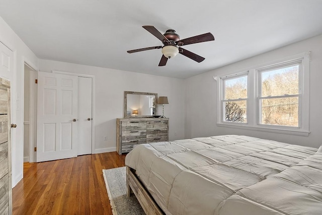 bedroom featuring light wood-type flooring and ceiling fan