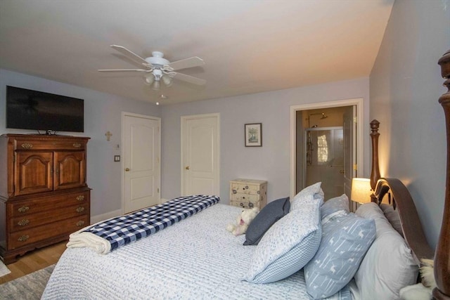 bedroom with ceiling fan and wood finished floors