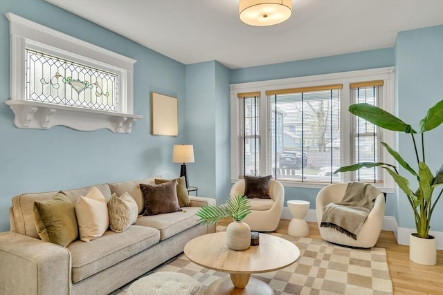 12 Highland Ave Unit A, Arlington, MA 02476 - living room featuring healthy amount of natural light and wood finished floors
