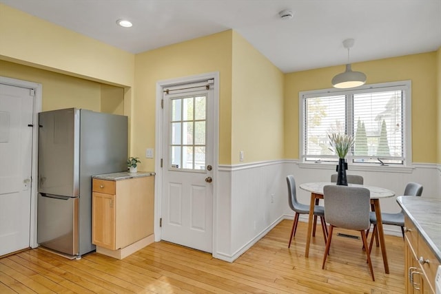 12 Highland Ave Unit A, Arlington, MA 02476 - dining room with a wainscoted wall and light wood-type flooring