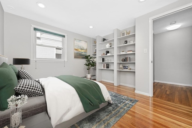 bedroom featuring hardwood / wood-style flooring