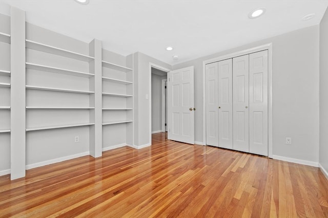 interior space featuring a closet and light hardwood / wood-style floors