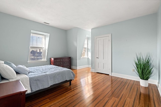 bedroom featuring hardwood / wood-style flooring