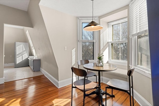 dining room with light hardwood / wood-style floors