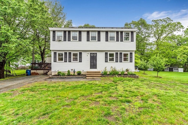 3 Sinclair St, Billerica, MA 01821 - colonial house with a front lawn and a wooden deck