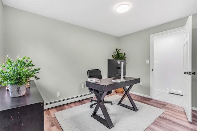 3 Sinclair St, Billerica, MA 01821 - office area featuring a baseboard heating unit, wood finished floors, baseboards, and baseboard heating