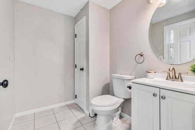 3 Sinclair St, Billerica, MA 01821 - bathroom with vanity, toilet, tile patterned flooring, and baseboards