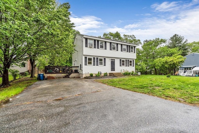 3 Sinclair St, Billerica, MA 01821 - colonial home featuring a front lawn, asphalt driveway, and a deck