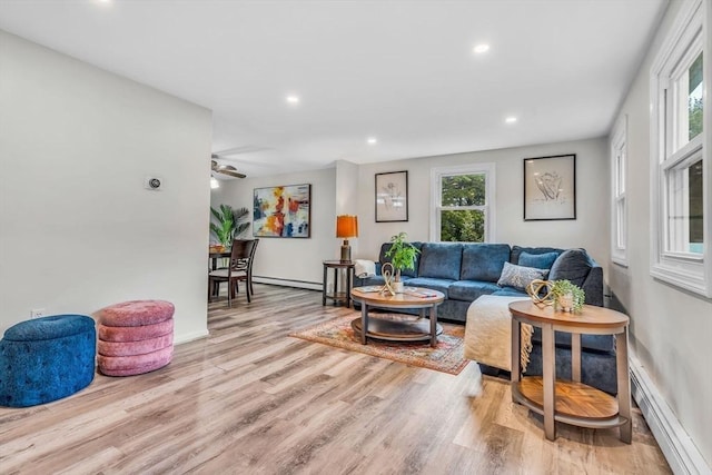 3 Sinclair St, Billerica, MA 01821 - living room with baseboard heating, a baseboard radiator, wood finished floors, recessed lighting, and a ceiling fan