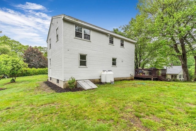 3 Sinclair St, Billerica, MA 01821 - back of property with a wooden deck and a yard