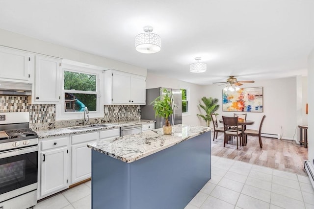 3 Sinclair St, Billerica, MA 01821 - kitchen featuring appliances with stainless steel finishes, a sink, ceiling fan, and plenty of natural light