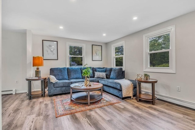 3 Sinclair St, Billerica, MA 01821 - living area featuring baseboard heating, wood finished floors, and recessed lighting