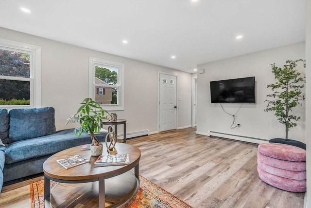 3 Sinclair St, Billerica, MA 01821 - living area featuring baseboard heating, recessed lighting, healthy amount of natural light, and light wood-style flooring