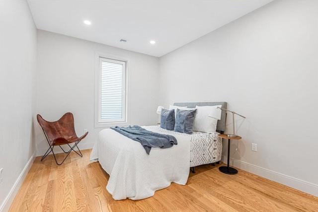 bedroom featuring hardwood / wood-style flooring