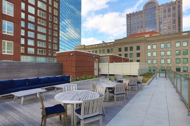 400 Stuart St Unit 15G, Boston, MA 02116 - deck featuring an outdoor living space and outdoor dining area