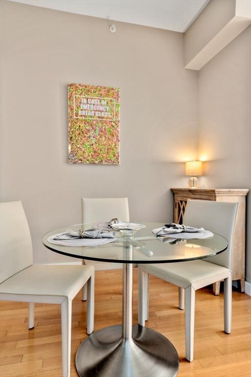 400 Stuart St Unit 15G, Boston, MA 02116 - dining area featuring light wood-style floors