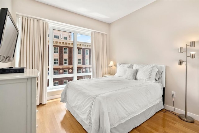 400 Stuart St Unit 15G, Boston, MA 02116 - bedroom with light wood-style floors and baseboards