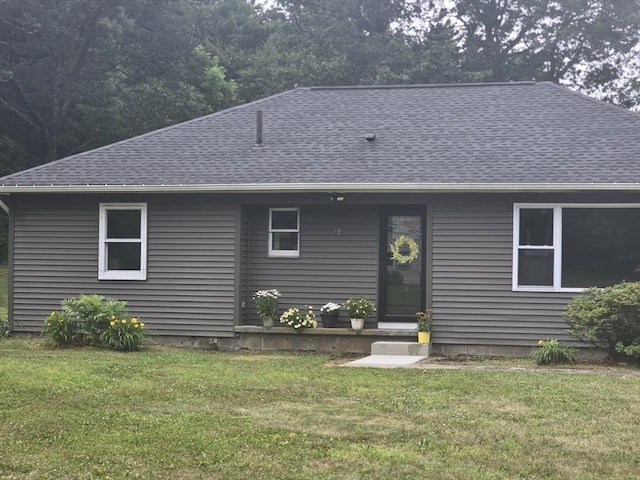 47 Flynt, Palmer, MA 01069 - view of front facade featuring roof with shingles and a front lawn