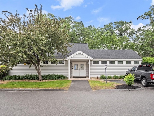 49 Meadow Pond Dr Unit I, Leominster, MA 01453 - view of front of property with a shingled roof and french doors