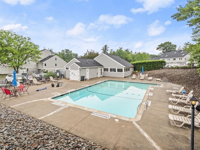49 Meadow Pond Dr Unit I, Leominster, MA 01453 - community pool with a patio and a residential view